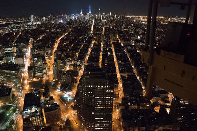 Illuminated cityscape at night