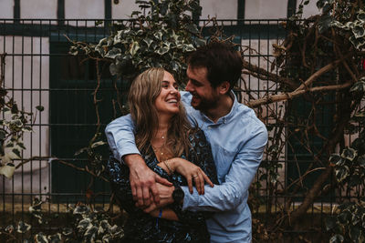 Young couple standing outdoors