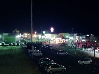 Cars on street at night