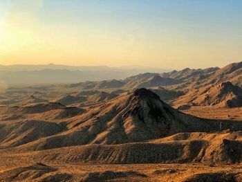 View of volcanic mountain during sunset