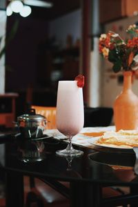 Close-up of tea in glass on table