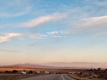 Road against sky during sunset