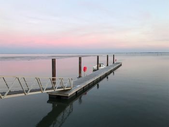 Scenic view of sea against sky at sunset