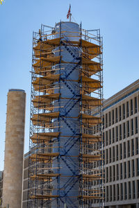 Low angle view of skyscrapers against clear sky