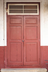 Closed wooden door of building