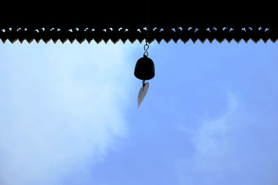 Low angle view of a horse hanging on roof