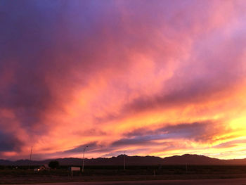 Scenic view of dramatic sky during sunset