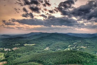 Scenic view of landscape against sky during sunset