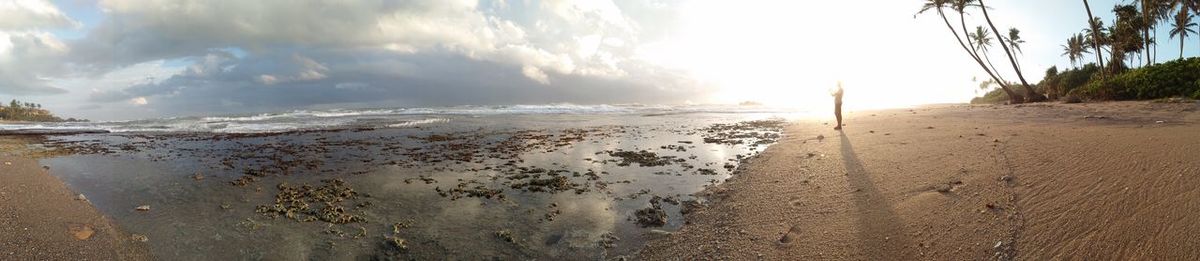 Panoramic view of beach against sky