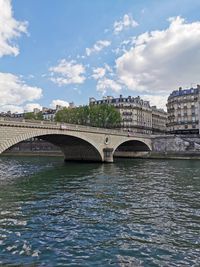 Arch bridge over river