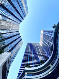 Low angle view of modern buildings against clear sky