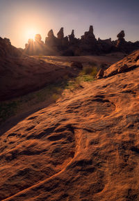 Scenic view of landscape against sky during sunset