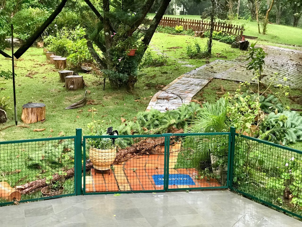 HIGH ANGLE VIEW OF BUILT STRUCTURE BY POND