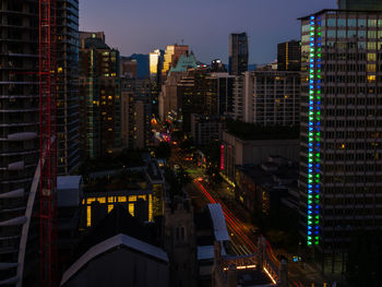 Illuminated buildings in downtown vancouver city at night