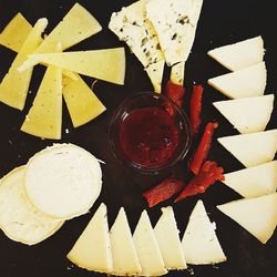 Directly above shot of cheese and fork on table