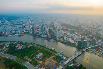 High angle view of river amidst buildings in city