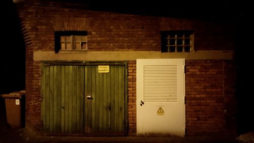 Closed door of building at night