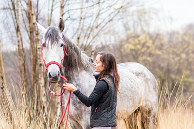 Horse standing on field