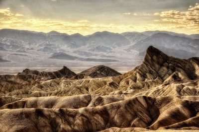 Scenic view of landscape against sky during sunset