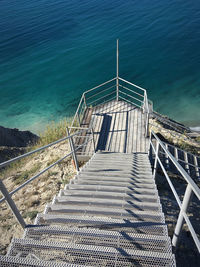 High angle view of staircase at beach