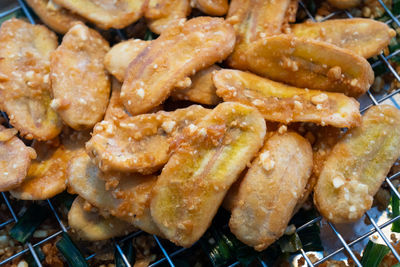 Close-up of meat on barbecue grill