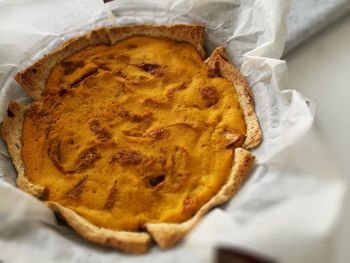 High angle view of pumpkin pie on table