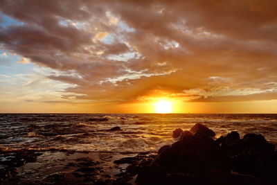 Scenic view of sea against sky during sunset