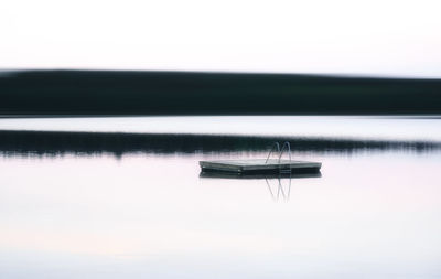 Scenic view of lake against clear sky