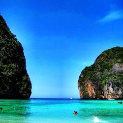 Scenic view of sea against blue sky