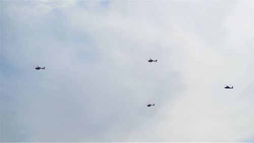 Low angle view of airplane flying in sky