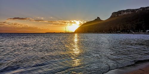 Scenic view of sea against sky during sunset