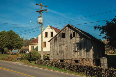 Old rural house made of wood in a traditional style, on a country road near bento gonçalves. brazil.