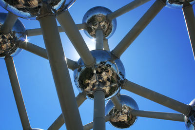 Low angle view of metal structure against sky