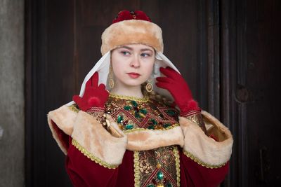 Smiling teenage girl wearing traditional clothes