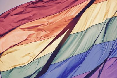 Low angle view of rainbow flag