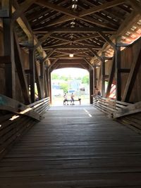 People walking in corridor