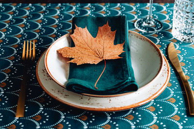 High angle view of dry leaves on table