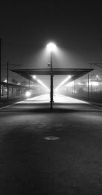 Illuminated street light at night