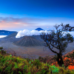 Scenic view of volcanic mountain against sky