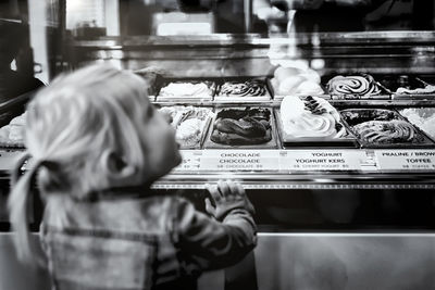 Girl at ice cream parlour