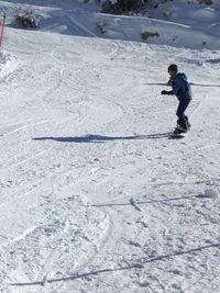 High angle view of man in snow