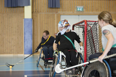 Disabled people playing in gym