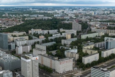 High angle view of buildings in city against sky