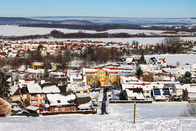 High angle view of townscape against sky during winter