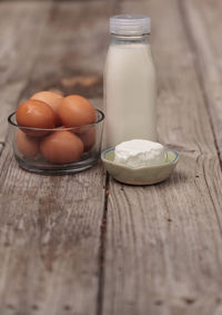 Close-up of eggs in jar on table