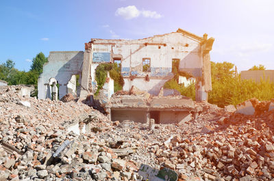 Low angle view of old ruins against sky