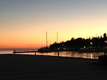 Scenic view of beach at sunset