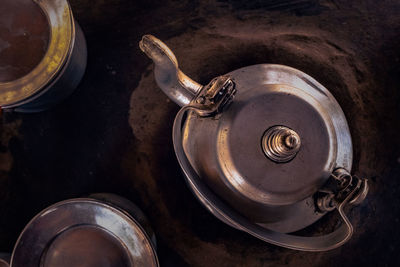 High angle view of old machine on table