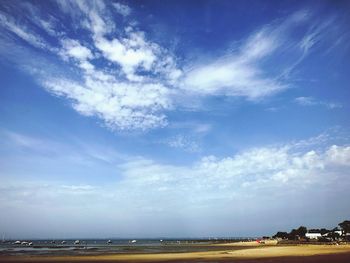 Scenic view of landscape against blue sky
