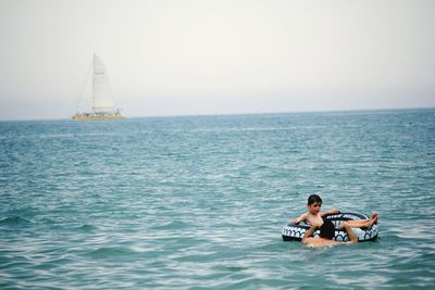Boat sailing in sea